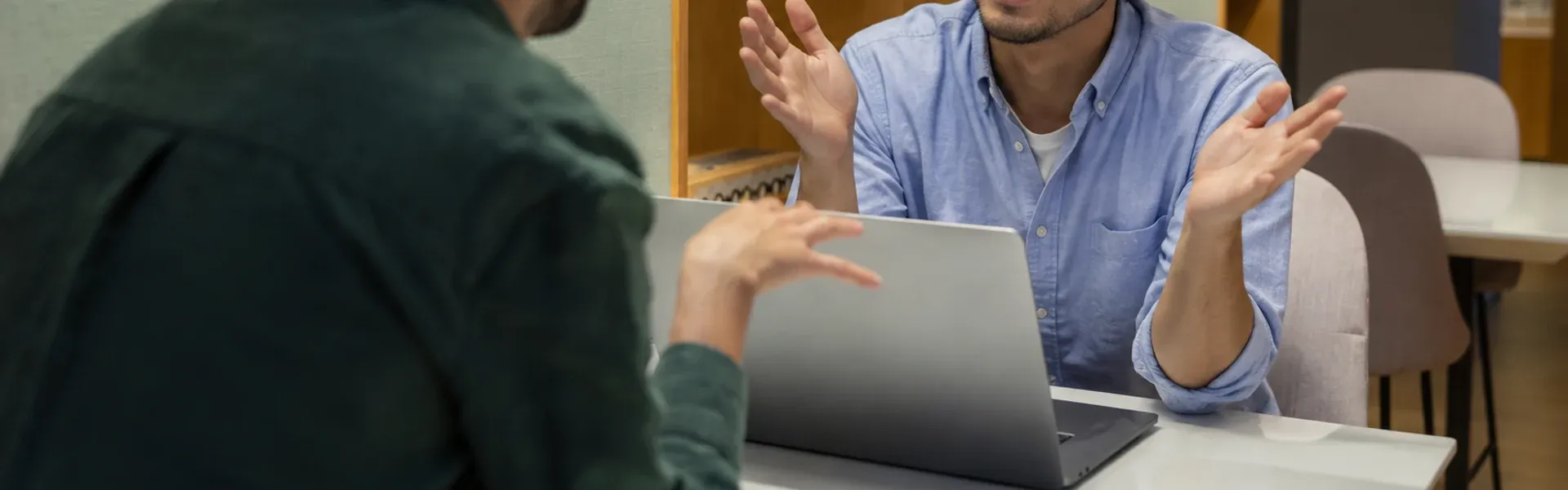 Business adviser helping a client review performance