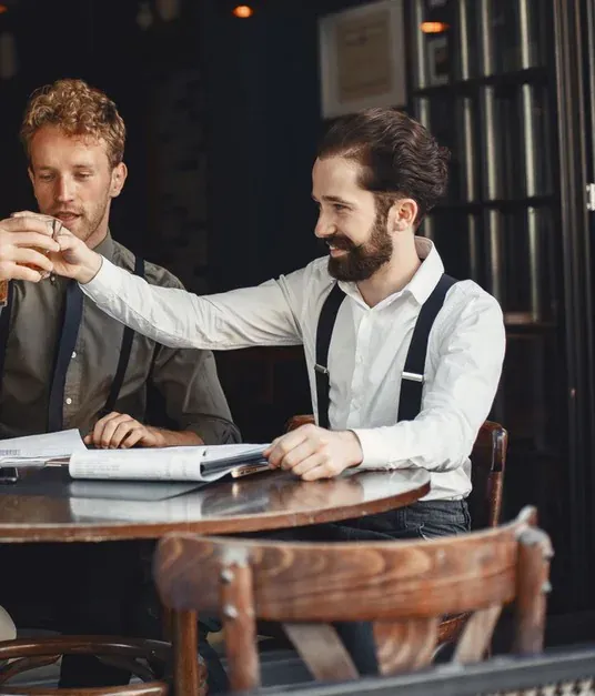 Two consultants discussing a business strategy