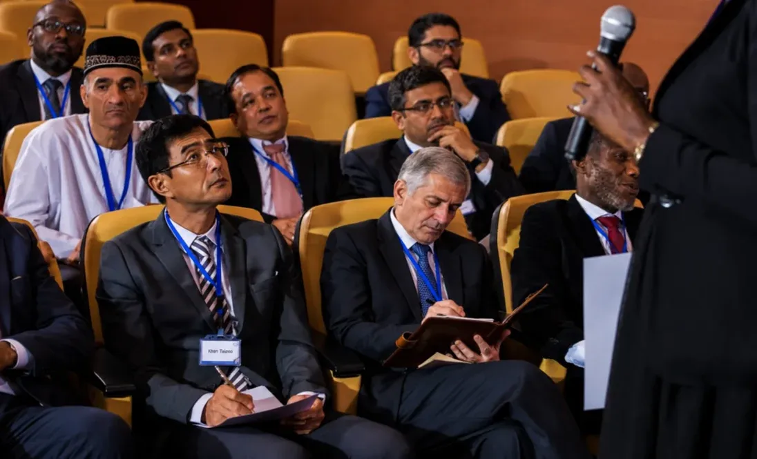 Audience participating in a business conference