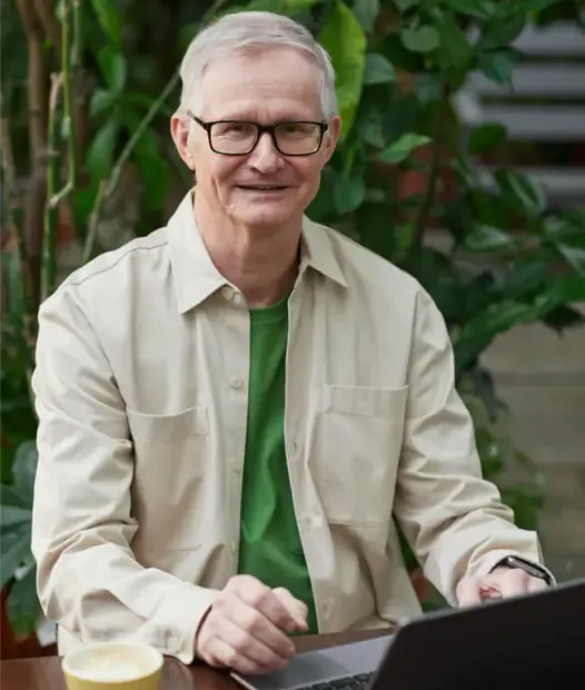 Business adviser working at a laptop